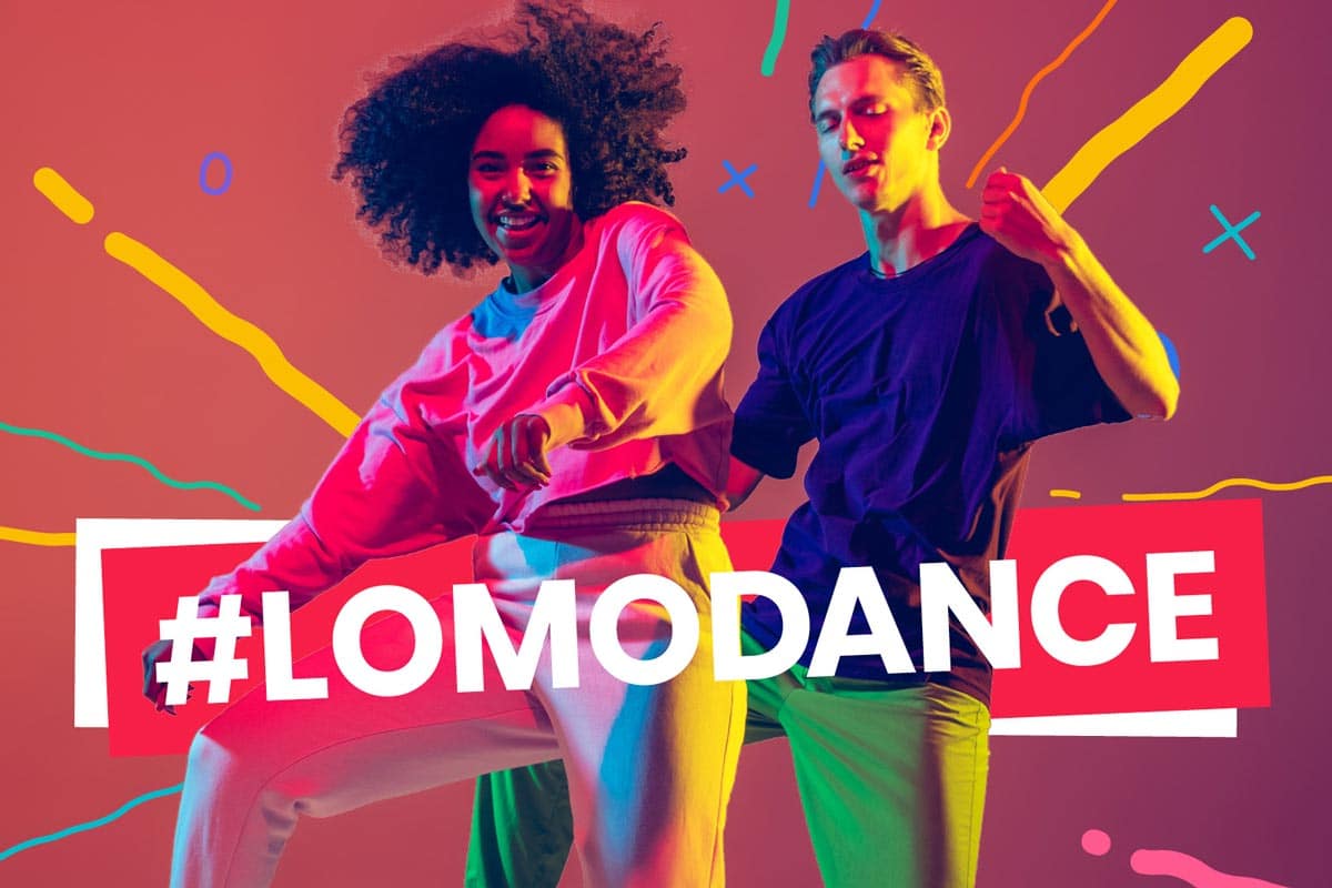 mulher e homem dançando sobre fundo colorido com a hashtag #lomodance