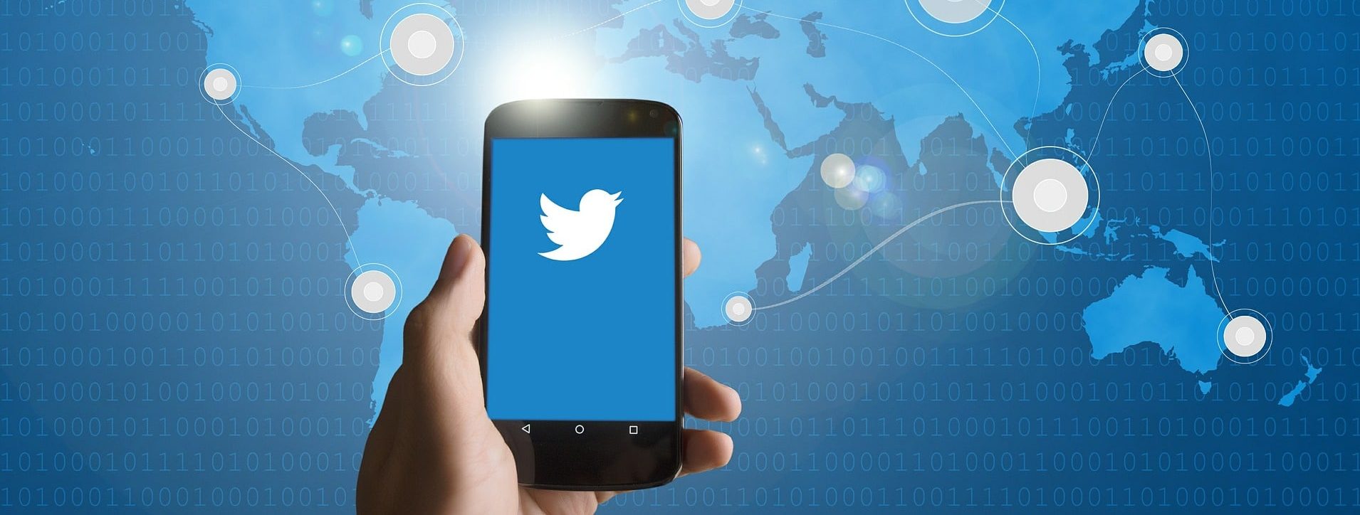 Montagem de um smartphone com o Twitter aberto enviando mensagens diretas pelo mundo com um mapa no fundo